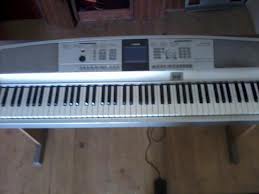 Grand Piano  Yamaha DGX 505 Miniature 2